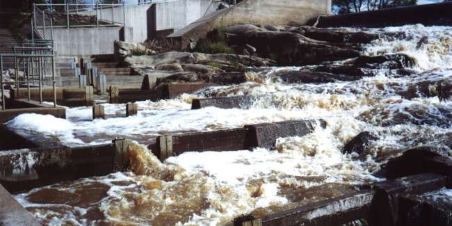 water rushing water in a dam