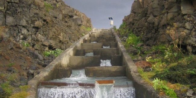 a water flowing down a steep hill