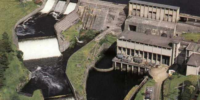 a water dam with a dam and a building